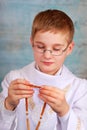Boy going to the first holy communion with rosary Royalty Free Stock Photo