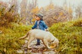 Boy with golden retriever puppy Royalty Free Stock Photo