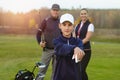 Happy family is playing golf in autumn Royalty Free Stock Photo