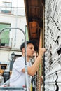 Boy graffiti, painted with marker pen, on the blind of a store