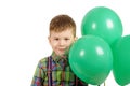 Boy with green balloons