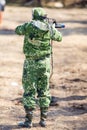 Boy with a gun playing lazer tag