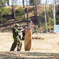 Boy with a gun playing lazer tag