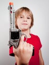 Boy with gun toy Royalty Free Stock Photo