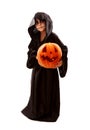 Boy in halloween zombie fancy-dress with pumpkin Royalty Free Stock Photo