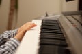 Boy hand playing the piano Royalty Free Stock Photo