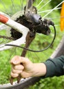 boy hand repair tire on bicycle Royalty Free Stock Photo