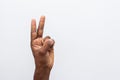 Boy hand showing number two gesture symbol  on white background. Gesturing number 2. Number two in sign language. counting Royalty Free Stock Photo