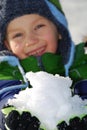 Boy with Handful of Snow