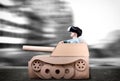 Boy in handmade cardboard panzer. Royalty Free Stock Photo