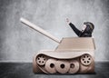 Boy in handmade cardboard panzer.