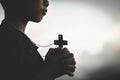 Boy hands holding a holy cross and praying to God, Child Praying for God Religion Royalty Free Stock Photo