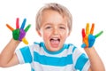 Boy with hands painted in colorful paints ready to make hand prints, creative education concept Royalty Free Stock Photo