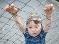 Boy hanging on the bars Royalty Free Stock Photo