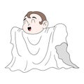 Boy is happy wearing a white blanket costume to become a ghost