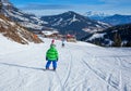 Boy has a fun on ski Royalty Free Stock Photo