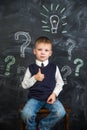 The boy has an idea drawn on the Board light bulb Royalty Free Stock Photo