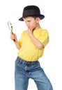 Boy in hat with magnifying glass