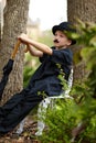 Boy with hat and umbrella