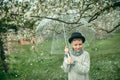 Boy in a hat with an umbrella Royalty Free Stock Photo