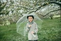 Boy in a hat with an umbrella Royalty Free Stock Photo
