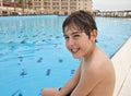 The Boy is Have Fun in the Swimming Pool Royalty Free Stock Photo