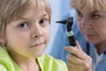 Boy having done ear examination Royalty Free Stock Photo