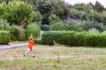 Boy having fun flying a kite in summer Royalty Free Stock Photo