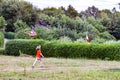 Boy having fun flying a kite in summer Royalty Free Stock Photo