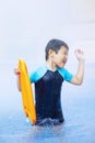 Boy having fun in the swimming pool, water park Royalty Free Stock Photo