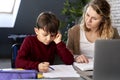 Boy having problems in finishing homework Royalty Free Stock Photo