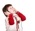 Boy in headphones listen music. Royalty Free Stock Photo