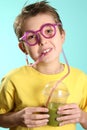 Boy with a healthy superjuice Royalty Free Stock Photo