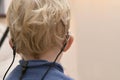 Boy With A Hearing Aids And Cochlear Implants Royalty Free Stock Photo