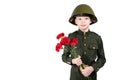 Boy in a helmet wearing a military uniform and holding red flowers close-up, isolated on white Royalty Free Stock Photo