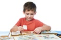 Boy with his collection of old postage stamps isolated Royalty Free Stock Photo