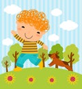 A boy and his dog playing in the park Royalty Free Stock Photo