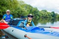 Boy with his father kayaking