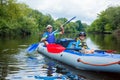 Boy with his father kayaking