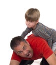 A boy on his fathers back, parenting can be diffic Royalty Free Stock Photo