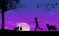 A boy with his fishing pole and his dog are seen returning home at sunset Royalty Free Stock Photo