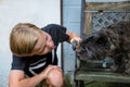 Boy and his friend a brown cairn terrier