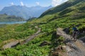 Boy on his mountain bike going down the path from Jochpass Royalty Free Stock Photo