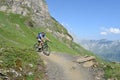 Boy on his mountain bike going down the path from Jochpass Royalty Free Stock Photo