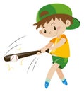 Boy hitting ball with wooden bat Royalty Free Stock Photo