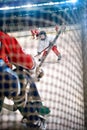 Boy hockey players shoots the puck and attacks Royalty Free Stock Photo