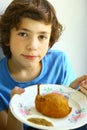 Boy hold chicken kiev plate Royalty Free Stock Photo