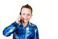 Boy hold mobile phone and smiles, Isolated on white background Royalty Free Stock Photo