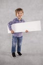 Boy of holding an advertising space, young businessman with copy Royalty Free Stock Photo