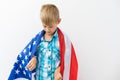 Boy holding American flag, isolated on white Royalty Free Stock Photo